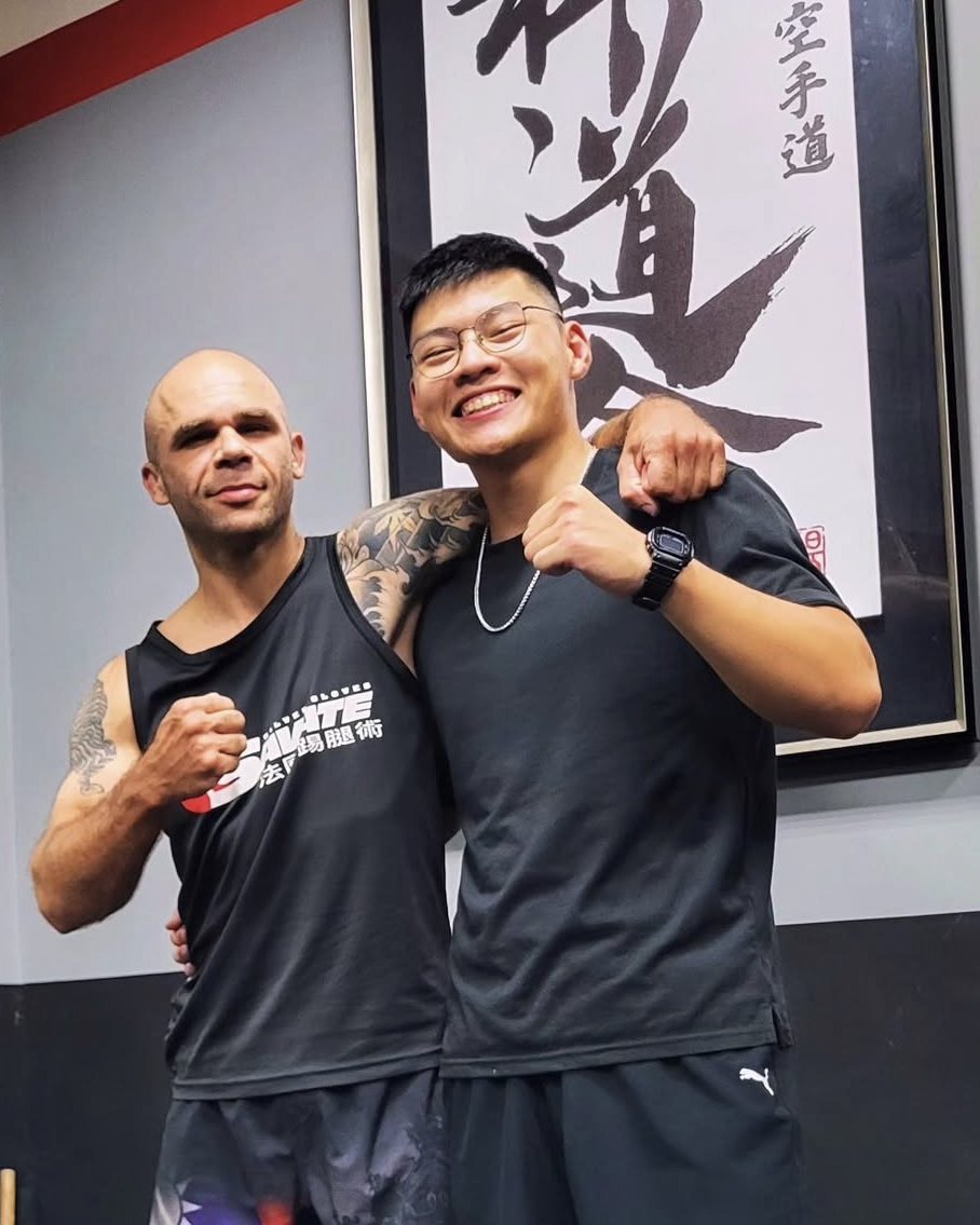 Coach Josh with a training partner in the gym